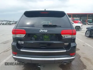 2015 Jeep Grand Cherokee Summit z VIN 1C4RJFJT0FC674494, wystawiony jako IAAI lot #42056835 z przebiegiem 143 969 mil mil oraz . Historia ofert i sprzedaży dostępna na DreamBid. Obrazek 17.