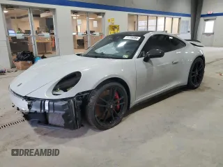 2023 Porsche 911 Carrera S with VIN WP0AB2A92PS220410, listed as a Copart auction lot 85706084 with 14,460 mi miles and Salvage Title. Bid and sale history available at carsss.com. Image 1.