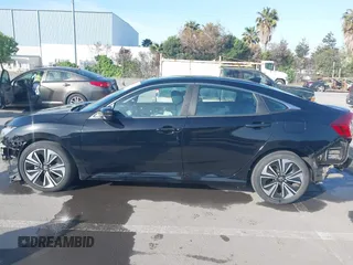 2016 Honda Civic Sedan EX-L with VIN 19XFC1F73GE215112, listed as a IAAI auction lot 42093218 with 67,233 mi miles. Bid and sale history available at carsss.com. Image 15.
