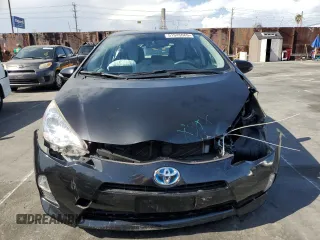 2014 Toyota Prius One with VIN JTDKDTB38E1574630, listed as a Copart auction lot 51945065 with 92,827 mi miles and Salvage Title. Bid and sale history available at DreamBid. Image 5.
