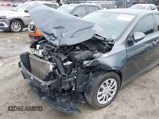 2021 Kia Forte LXS with VIN 3KPF24AD4ME266471, listed as a IAAI auction lot 41972334 with 54,346 mi miles and . Bid and sale history available at DreamBid. Image 6.