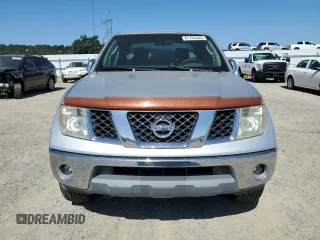 2005 Nissan Frontier LE z VIN 1N6AD07W95C443995, wystawiony jako Copart lot #61102285 z przebiegiem 248 740 mil mil oraz Czysty tytuł • Clean title. Historia ofert i sprzedaży dostępna na DreamBid. Obrazek 5.