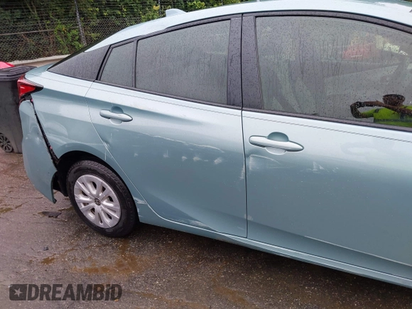 2022 Toyota Prius L Eco with VIN JTDKAMFU4N3158998, listed as a IAAI auction lot 42625041 with 43,033 mi miles and . Bid and sale history available at DreamBid. Image 18.