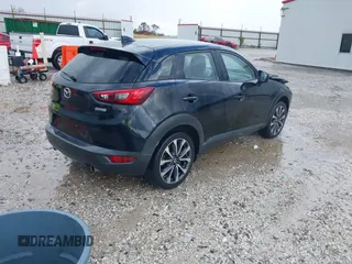 2019 Mazda CX-3 Touring with VIN JM1DKDC76K1406860, listed as a IAAI auction lot 40767122 with 162,636 mi miles. Bid and sale history available at carsss.com. Image 4.