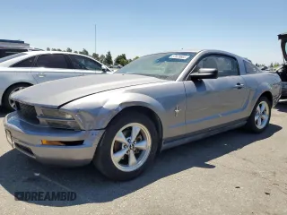 2007 Ford Mustang Deluxe with VIN 1ZVFT80N775319949, listed as a Copart auction lot 57623665 with 128,972 mi miles and Salvage title. Bid and sale history available at DreamBid. Image 1.