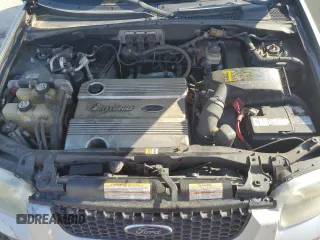 2005 Ford Escape Hybrid z VIN 1FMCU95HX5KB95634, wystawiony jako Copart lot #56513595 z przebiegiem 228 188 mil mil oraz Czysty tytuł • Clean title. Historia ofert i sprzedaży dostępna na DreamBid. Obrazek 12.