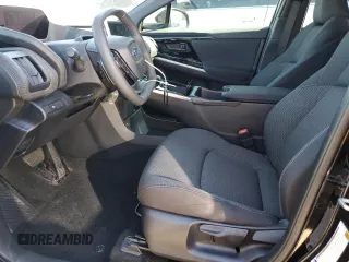 2024 Subaru Solterra Premium z VIN JTMABABA9RA064491, wystawiony jako Copart lot #52993485 z przebiegiem 9079 mil mil oraz Szkody całkowita. Historia ofert i sprzedaży dostępna na DreamBid. Obrazek 7.