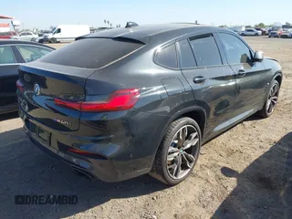 2020 BMW X4 M40i with VIN 5UX2V5C04L9D26548, listed as a IAAI auction lot 42473480 with Not provided miles and . Bid and sale history available at DreamBid. Image 4.