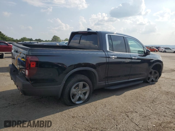 2022 Honda Ridgeline RTL-E with VIN 5FPYK3F7XNB023787, listed as a Copart auction lot 66883515 with 49,786 mi miles and Salvage title. Bid and sale history available at DreamBid. Image 3.