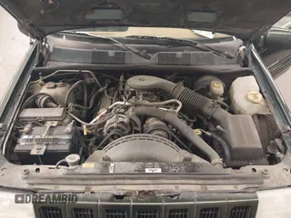1997 Jeep Grand Cherokee Limited with VIN 1J4GZ78Y0VC684023, listed as a IAAI auction lot 42090436 with 310,831 mi miles. Bid and sale history available at carsss.com. Image 10.
