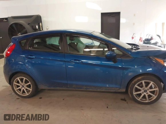 2019 Ford Fiesta SE with VIN 3FADP4EJ6KM124270, listed as a IAAI auction lot 40962134 with 122,757 mi miles. Bid and sale history available at carsss.com. Image 13.