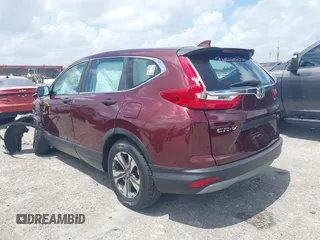 2019 Honda CR-V LX with VIN 2HKRW5H33KH402697, listed as a IAAI auction lot 41942219 with 80,826 mi miles. Bid and sale history available at carsss.com. Image 3.