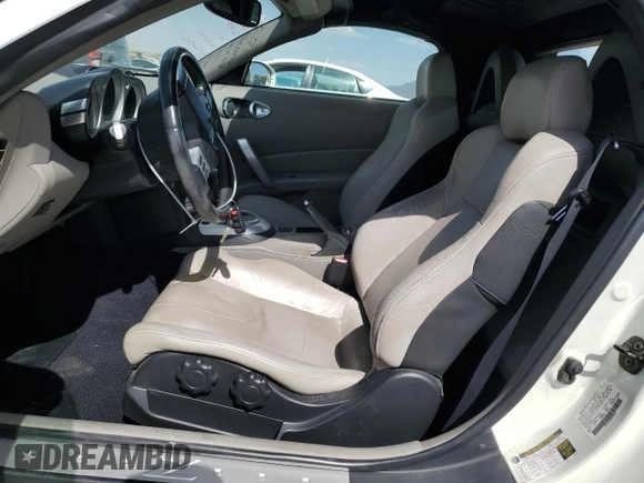 2006 Nissan 350Z Touring z VIN JN1AZ36A56M450937, wystawiony jako Copart lot #56544955 z przebiegiem 102 027 mil mil oraz Szkoda całkowita • Salvage title. Historia ofert i sprzedaży dostępna na DreamBid. Obrazek 7.