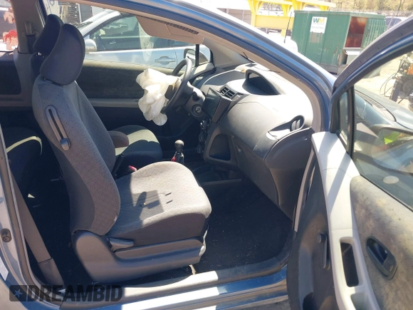 2010 Toyota Yaris with VIN JTDJT4K36A5285298, listed as a IAAI auction lot 42003609 with 158,418 mi miles. Bid and sale history available at carsss.com. Image 5.