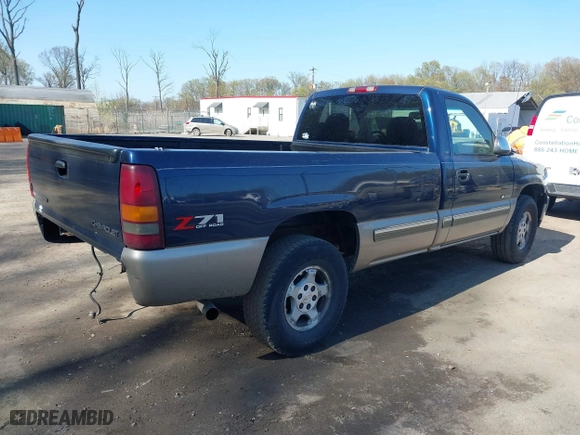 2001 Chevrolet Silverado 1500 with VIN 1GCEK14T31E300100, listed as a IAAI auction lot 41977664 with 193,742 mi miles. Bid and sale history available at carsss.com. Image 4.