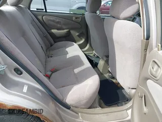 1999 Chevrolet Prizm z VIN 1Y1SK5488XZ446950, wystawiony jako IAAI lot #41798129 z przebiegiem 292 798 mil mil oraz . Historia ofert i sprzedaży dostępna na DreamBid. Obrazek 8.