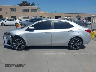 2019 Toyota Corolla L with VIN 5YFBURHE5KP877691, listed as a IAAI auction lot 42108591 with 85,813 mi miles and . Bid and sale history available at DreamBid. Image 14.