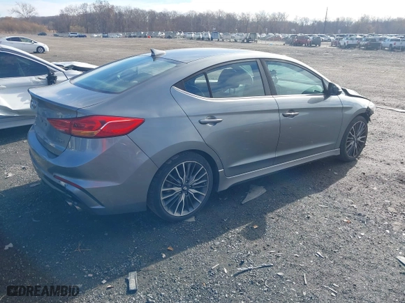 2018 Hyundai Elantra Sport with VIN KMHD04LB8JU561462, listed as a IAAI auction lot 40848718 with 107,618 mi miles. Bid and sale history available at carsss.com. Image 4.