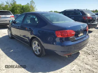 2013 Volkswagen Jetta S with VIN 3VW1K7AJ9DM399845, listed as a Copart auction lot 57864295 with 136,909 mi miles and Salvage title. Bid and sale history available at DreamBid. Image 2.