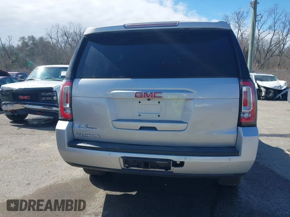 2019 GMC Yukon SLT with VIN 1GKS1BKC5KR277478, listed as a IAAI auction lot 41632624 with 86,770 mi miles. Bid and sale history available at carsss.com. Image 17.