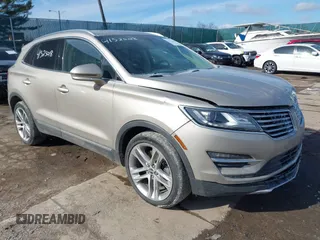 2015 Lincoln MKC with VIN 5LMCJ2A96FUJ47386, listed as a IAAI auction lot 41525018 with 97,670 mi miles. Bid and sale history available at carsss.com. Image 1.