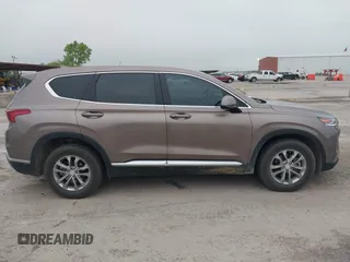 2020 Hyundai Santa Fe SEL z VIN 5NMS3CAD2LH164373, wystawiony jako IAAI lot #42099713 z przebiegiem 49 566 mil mil oraz . Historia ofert i sprzedaży dostępna na DreamBid. Obrazek 13.
