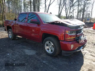 2018 Chevrolet Silverado 1500 LT with VIN 3GCUKREC4JG204672, listed as a IAAI auction lot 41638941 with 134,506 mi miles. Bid and sale history available at carsss.com. Image 1.