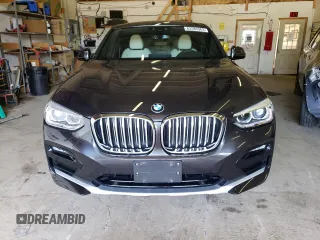 2021 BMW X4 xDrive30i with VIN 5UX2V1C09M9H40435, listed as a Copart auction lot 63585963 with 26,409 mi miles. Bid and sale history available at carsss.com. Image 5.