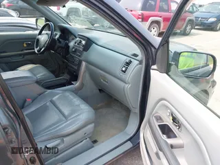 2003 Honda Pilot EX z VIN 2HKYF18573H616406, wystawiony jako IAAI lot #42363152 z przebiegiem 323 672 mil mil oraz . Historia ofert i sprzedaży dostępna na DreamBid. Obrazek 5.