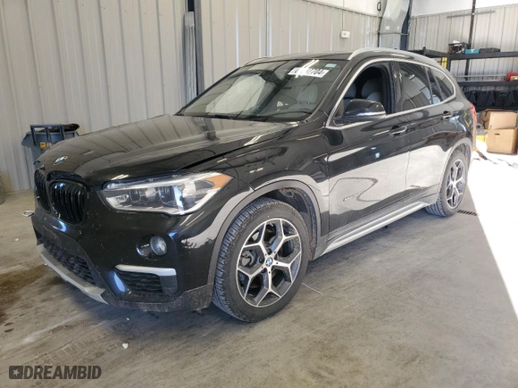 2017 BMW X1 xDrive28i with VIN WBXHT3Z31H4A65698, listed as a Copart auction lot 69937704 with 119,138 mi miles and Salvage Title. Bid and sale history available at carsss.com. Image 1.