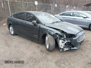 2015 Ford Fusion SE Hybrid with VIN 3FA6P0LU0FR242452, listed as a IAAI auction lot 41790218 with 163,741 mi miles. Bid and sale history available at carsss.com. Image 1.