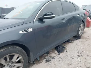 2016 Kia Optima LX z VIN KNAGT4L30G5070000, wystawiony jako IAAI lot #42169747 z przebiegiem 267 498 mil mil oraz . Historia ofert i sprzedaży dostępna na DreamBid. Obrazek 6.