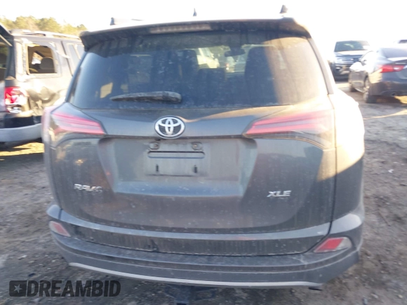 2018 Toyota RAV4 XLE z VIN 2T3WFREV6JW503353, wystawiony jako IAAI lot #41641002 z przebiegiem 54 013 mil mil oraz . Historia ofert i sprzedaży dostępna na DreamBid. Obrazek 16.