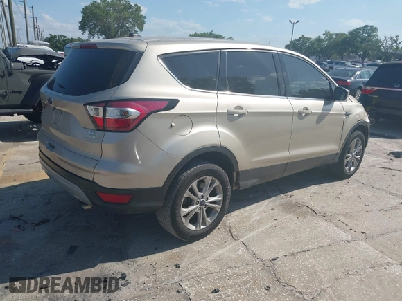 2017 Ford Escape SE z VIN 1FMCU0GD8HUC60074, wystawiony jako IAAI lot #41918443 z przebiegiem 85 787 mil mil oraz . Historia ofert i sprzedaży dostępna na DreamBid. Obrazek 4.