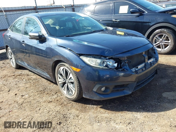 2016 Honda Civic Sedan EX-T with VIN 19XFC1F30GE025233, listed as a IAAI auction lot 41987604 with 129,311 mi miles. Bid and sale history available at carsss.com. Image 1.