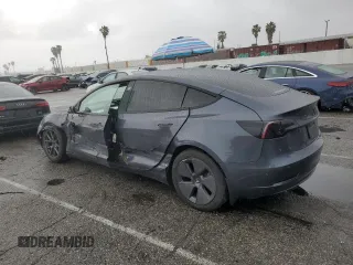2023 Tesla Model 3 with VIN 5YJ3E1EA5PF640805, listed as a Copart auction lot 48389265 with 28,193 mi miles and Salvage title. Bid and sale history available at DreamBid. Image 2.