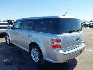 2011 Ford Flex SEL z VIN 2FMGK5CC6BBD33666, wystawiony jako IAAI lot #42237123 z przebiegiem 205 239 mil mil oraz . Historia ofert i sprzedaży dostępna na DreamBid. Obrazek 3.