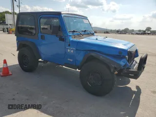 2002 Jeep Wrangler X with VIN 1J4FA39S92P776435, listed as a Copart auction lot 62792235 with 182,385 mi miles and Salvage title. Bid and sale history available at DreamBid. Image 4.