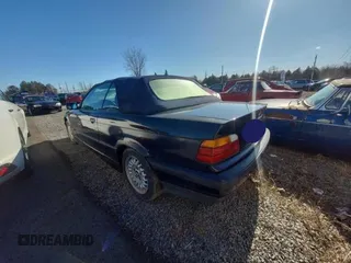 1995 BMW 3 Series 318iC with VIN WBABK6328SED18313, listed as a Copart auction lot 51153305 with 285,000 mi miles and Salvage Title. Bid and sale history available at carsss.com. Image 3.