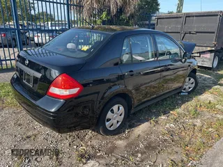 2010 Nissan Versa 1.6 with VIN 3N1CC1AP5AL391286, listed as a IAAI auction lot 42005172 with 33,441 mi miles. Bid and sale history available at carsss.com. Image 4.