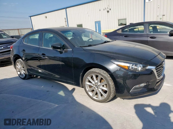 2017 Mazda 3 Touring with VIN 3MZBN1V70HM113085, listed as a Copart auction lot 53330555 with 83,379 mi miles and Salvage Title. Bid and sale history available at DreamBid. Image 4.