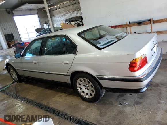 2000 BMW 7 Series 740iL with VIN WBAGH8341YDP13706, listed as a Copart auction lot 78727604 with 215,793 mi miles and Salvage Title. Bid and sale history available at carsss.com. Image 2.