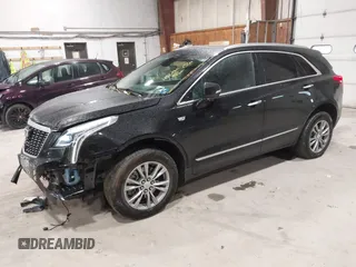 2022 Cadillac XT5 AWD Premium Luxury with VIN 1GYKNDRS8NZ163725, listed as a IAAI auction lot 42295528 with 45,614 mi miles and . Bid and sale history available at DreamBid. Image 2.