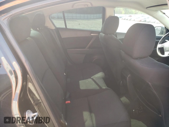 2013 Mazda 3 i SV z VIN JM1BL1TG4D1796203, wystawiony jako Copart lot #56365825 z przebiegiem 190 717 mil mil oraz Szkoda całkowita • Salvage title. Historia ofert i sprzedaży dostępna na DreamBid. Obrazek 10.