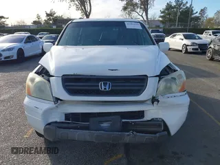 2005 Honda Pilot EX with VIN 5FNYF18475B060655, listed as a IAAI auction lot 41381619 with 142,680 mi miles and . Bid and sale history available at DreamBid. Image 12.