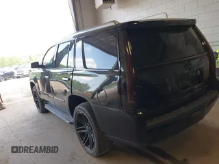 2015 Cadillac Escalade Luxury z VIN 1GYS4BKJ8FR213467, wystawiony jako IAAI lot #42460708 z przebiegiem 105 756 mil mil oraz . Historia ofert i sprzedaży dostępna na DreamBid. Obrazek 3.