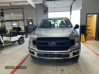 2020 Ford F-150 XL with VIN 1FTFW1E58LFC10396, listed as a IAAI auction lot 42122253 with 104,926 mi miles. Bid and sale history available at carsss.com. Image 1.