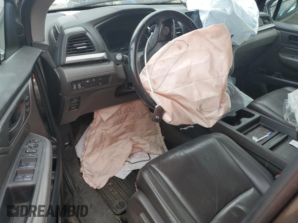 2019 Honda Odyssey EX-L z VIN 5FNRL6H79KB133976, wystawiony jako Copart lot #56988215 z przebiegiem Nie podano mil oraz Szkoda całkowita • Salvage title. Historia ofert i sprzedaży dostępna na DreamBid. Obrazek 8.