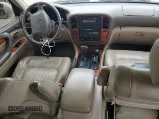 1999 Lexus LX 470 with VIN JT6HT00W2X0043805, listed as a Copart auction lot 54496735 with 520,244 mi miles and Clean Title. Bid and sale history available at DreamBid. Image 8.
