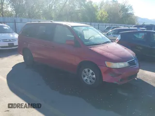 2004 Honda Odyssey EX with VIN 5FNRL18644B122591, listed as a IAAI auction lot 42207036 with 166,179 mi miles and . Bid and sale history available at DreamBid. Image 1.